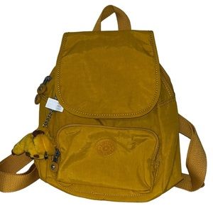 Kipling nylon small backpack, golden yellow color, new, monkey keychain